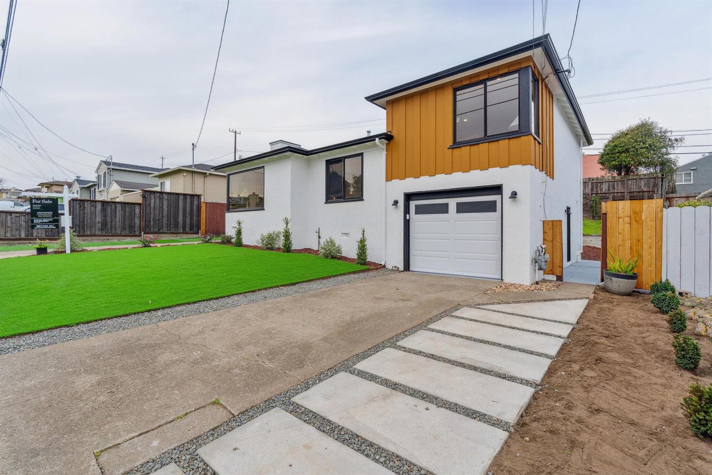 Rebuilt two-story home with new garage, board-and-batten siding and landscaped yard, Wildwood Avenue, Daly City