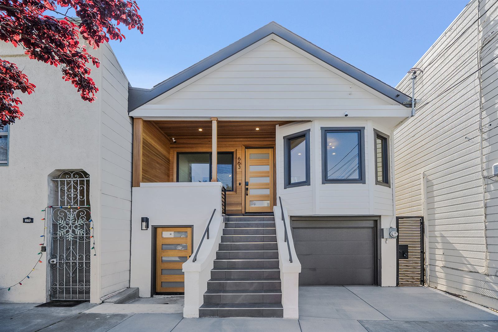 New gabled facade with cedar entry porch and bay window, Naples Street, San Francisco